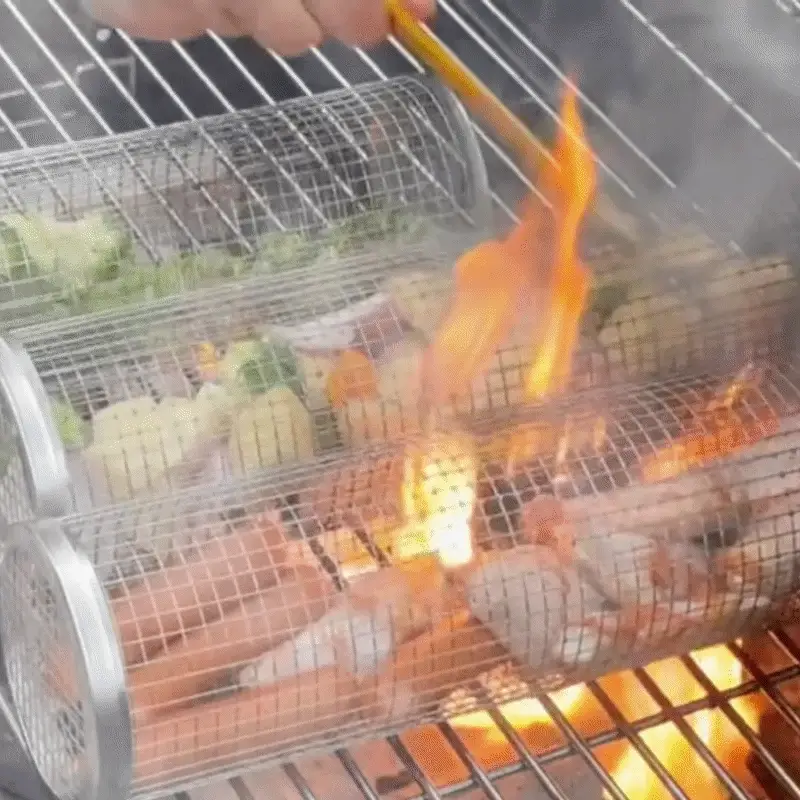 Rotating stainless steel BBQ grill basket in use