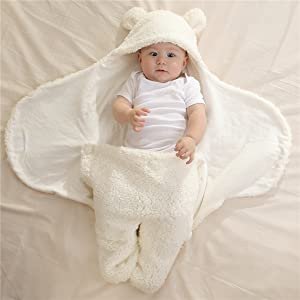 Baby's legs inside the blanket