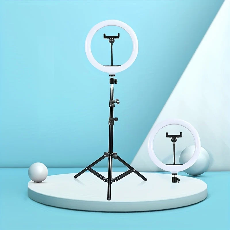 Ring light on a tripod stand with a phone holder, shown for taking selfies and recording video, view 4