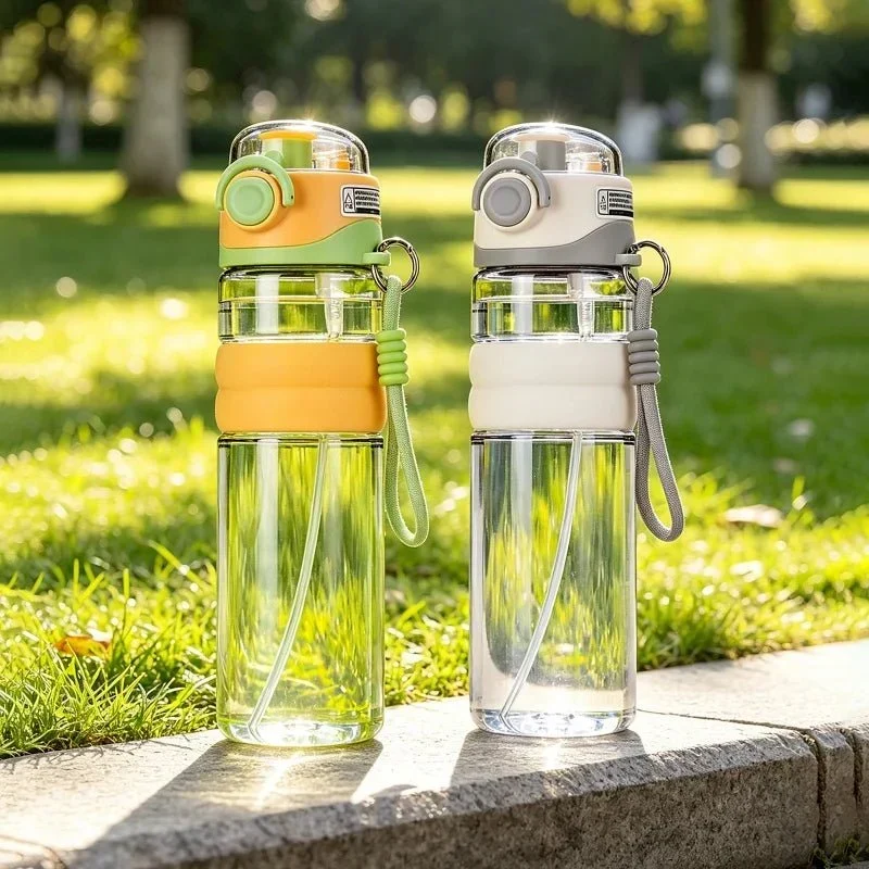 Leak-proof water bottle with mist spray for outdoor adventures |