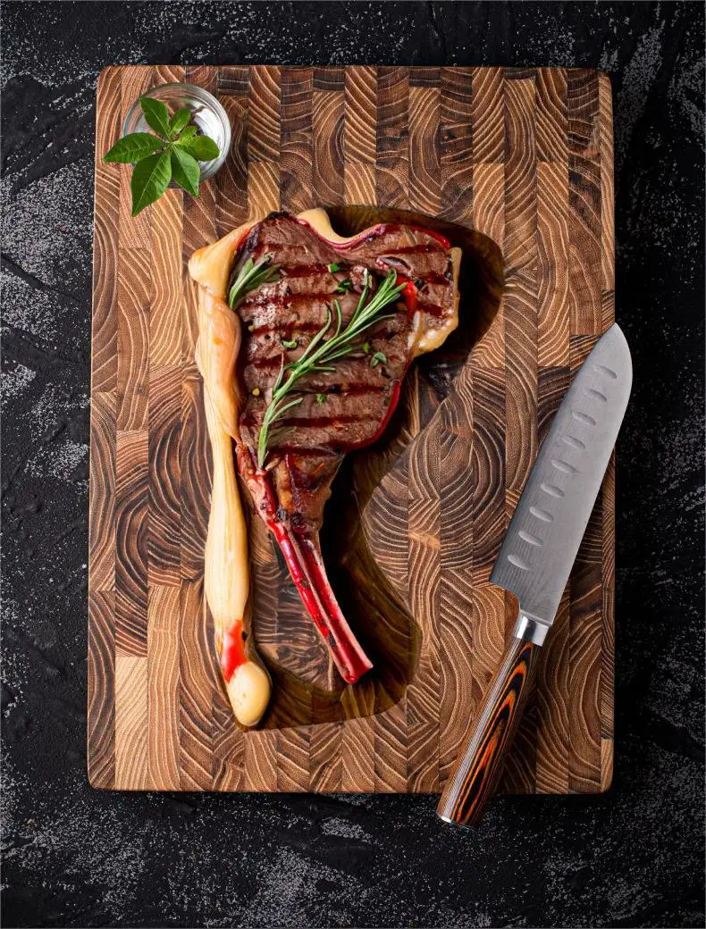 Teak end grain cutting board: a large wooden chopping and charcuterie board with hidden handles